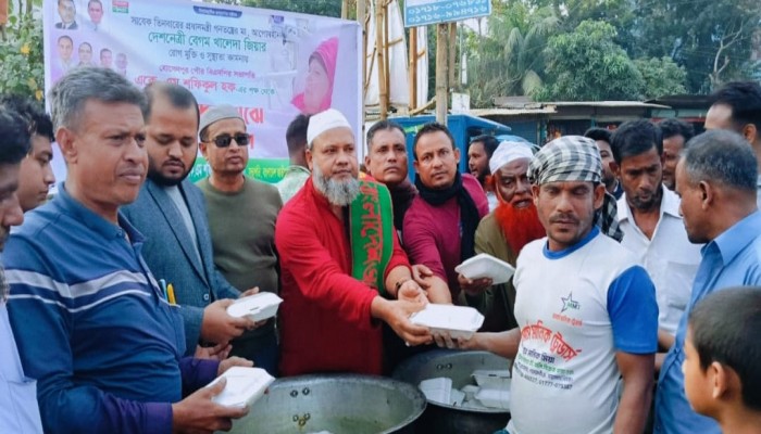 খালেদা জিয়ার সুস্থতা কামনায় হোসেনপুরে  বিএনপি নেতার খাবার বিতরণ